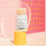 Lippe Balm with cap off and background image